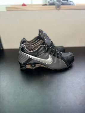 Nike Women’s Black and Silver Shock-Absorbent Sneakers